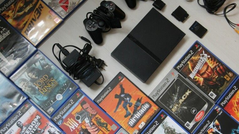 CDs e consolo do PLaystation
