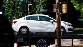 A vehicle involved in a shooting incident involving U.S. Immigration and Customs Enforcement (ICE) is towed from the scene in Biddeford, Maine, U.S., July 13, 2026. REUTERS/CJ Gunther