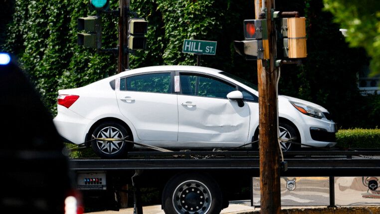 A vehicle involved in a shooting incident involving U.S. Immigration and Customs Enforcement (ICE) is towed from the scene in Biddeford, Maine, U.S., July 13, 2026. REUTERS/CJ Gunther